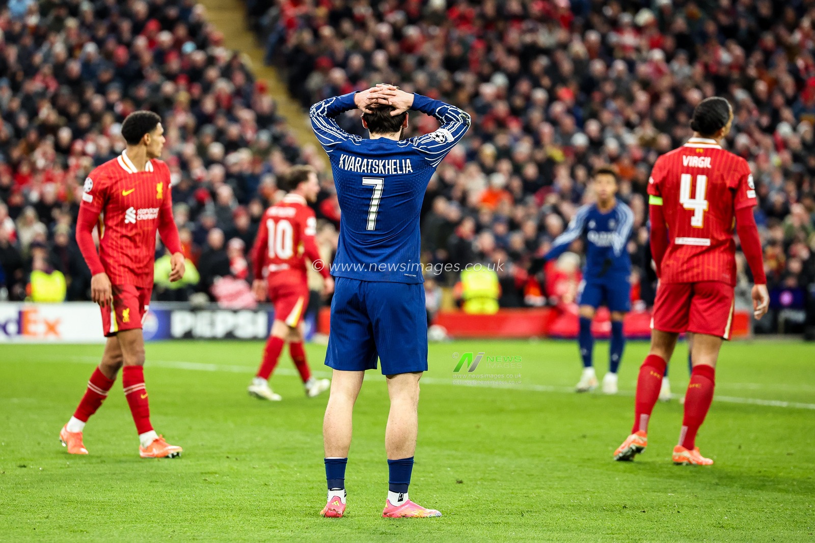 Khvicha Kvaratskhelia of Paris Saint-Germain reacts after a missed chance during the UEFA Champions League Last 16 match Liverpool vs Paris Saint-Germain at Anfield, Liverpool, United Kingdom, 11th March 2025

(Photo by Mark Cosgrove/News Images)