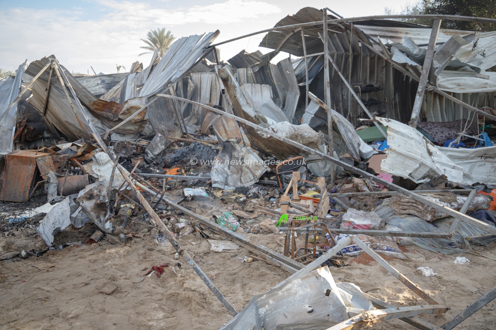 About 20 Palestinians, including children and women, were killed and several others were injured when the Israeli occupation army warplanes targeted the tents of displaced persons in the Mawasi Khan Younis area, south of the Gaza Strip, last night.(Photo: Mohammed Skaik/News Images)