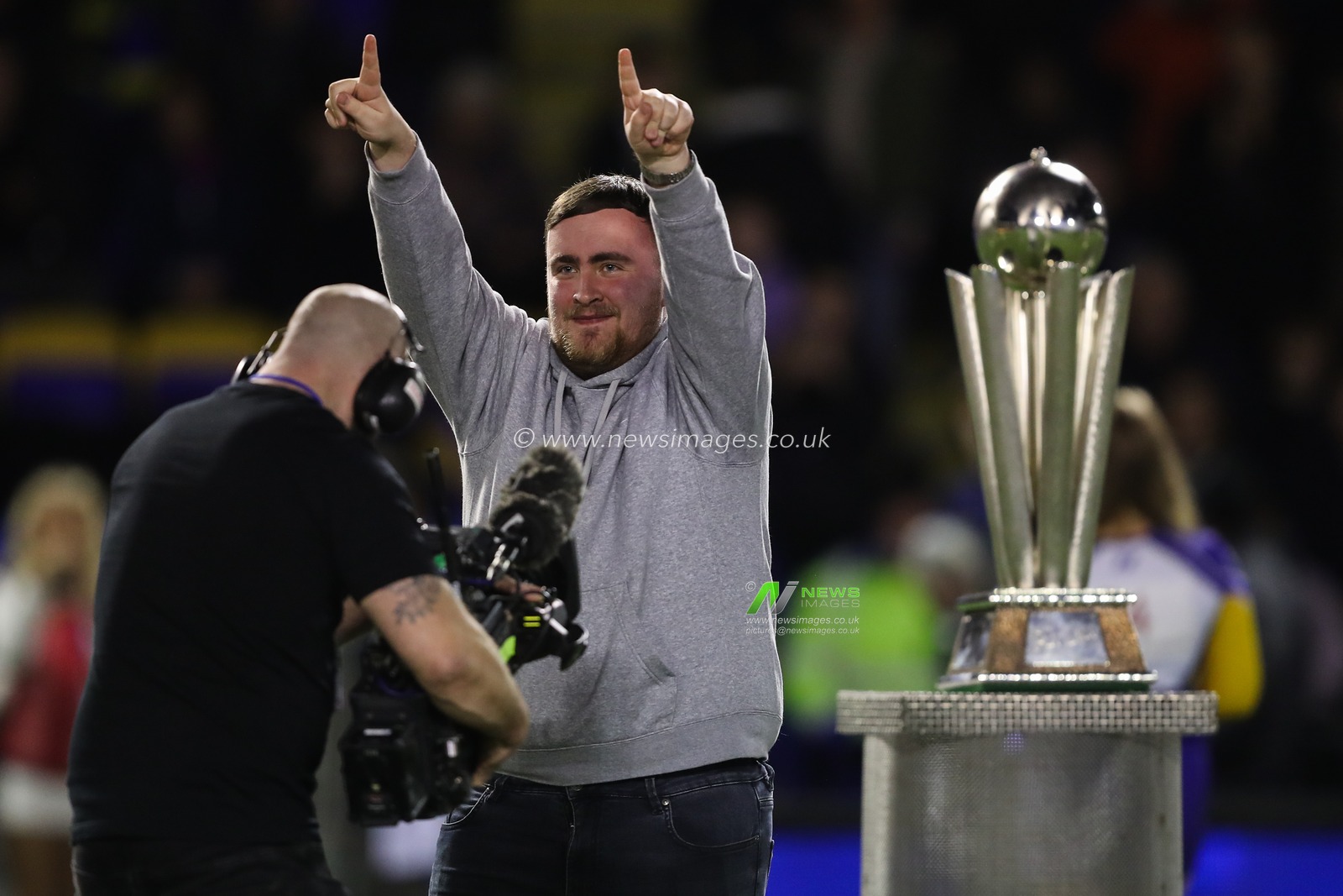 Luke Littler applauds the home fans during the Betfred Super League Round 2 match Warrington Wolves vs Catalans Dragons at Luke Littler Stadium, Warrington, United Kingdom, 21st February 2025

(Photo by Gareth Evans/News Images)