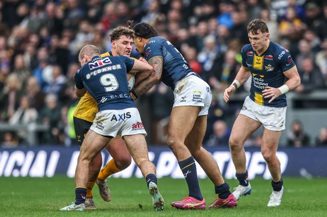 George Lawler of Castleford Tigers is tackled by Jarrod O'Connor of Leeds Rhinos during the Betfred Super League round 4 match Leeds Rhinos vs Castleford Tigers at AMT Headingley Stadium, Leeds, United Kingdom on 08 March 2026

(Photo by Alfie Cosgrove/News Images)