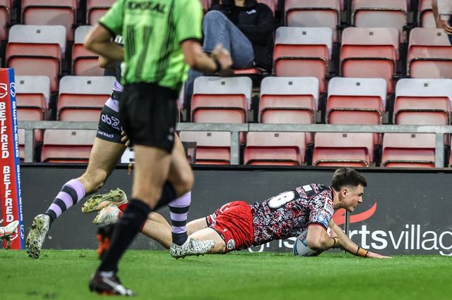 AJ Towse of Leigh Leopards goes over for a try during the Betfred Super League round 9 match Leigh Leopards vs Huddersfield Giants at Leigh Sports Village, Leigh, United Kingdom on 23 April 2026

(Photo by Alfie Cosgrove/News Images)