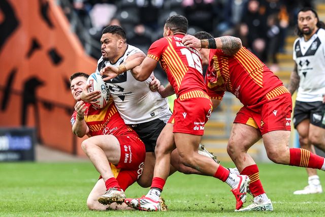 Sam Lisone of Hull FC is tackled by Kruise Leeming of Catalans Dragons during the Betfred Super League round 6 match Hull FC vs Catalans Dragons at MKM Stadium, Hull, United Kingdom on 29 March 2026

(Photo by Alfie Cosgrove/News Images)