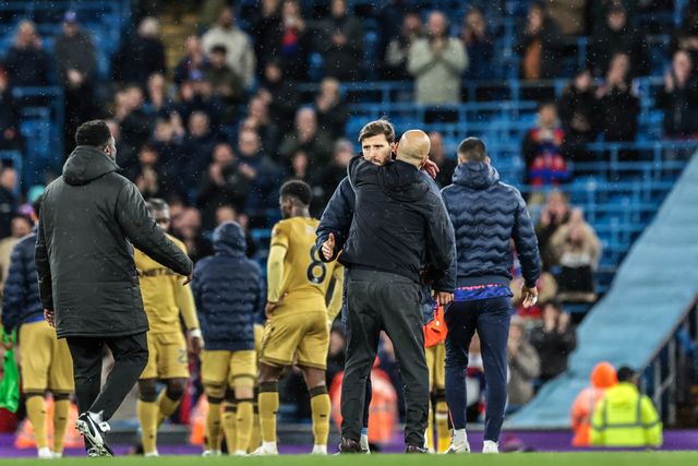 Ruben Dias of Manchester City embraces Josep Guardiola manager of Manchester City after the game during the Premier League match Manchester City vs Crystal Palace at Etihad Stadium, Manchester, United Kingdom on 13 May 2026

(Photo by Mark Cosgrove/News Images)