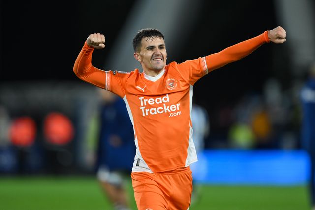 Albie Morgan of Blackpool celebrates with the fans at the end of the Sky Bet League 1 match Huddersfield Town vs Blackpool at John Smith's Stadium, Huddersfield, United Kingdom, 24th September 2024

(Photo by Craig Thomas/News Images)
