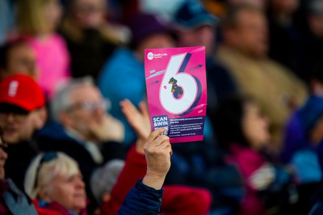 A fan holds a placard with a 6 during the England Women v New Zealand 1st Vitality IT20 match at The Central Co-Op County Ground, Derby, United Kingdom on 20 May 2026

(Photo by Maynard Manyowa/News Images)