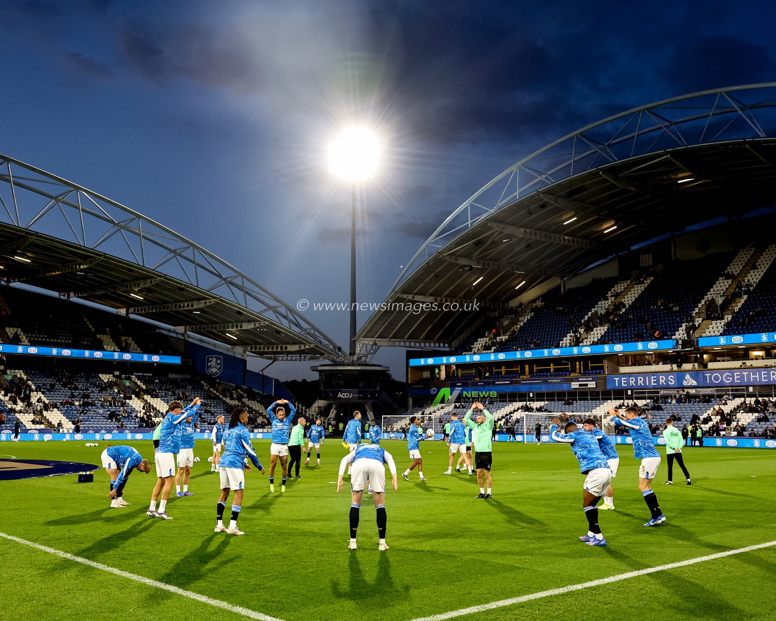 Huddersfield starting players in the pregame warmup session during the Carabao Cup Round 3 match Huddersfield Town vs Manchester City at Accu Stadium, Huddersfield, United Kingdom, 24th September 2025

(Photo by Mark Cosgrove/News Images)