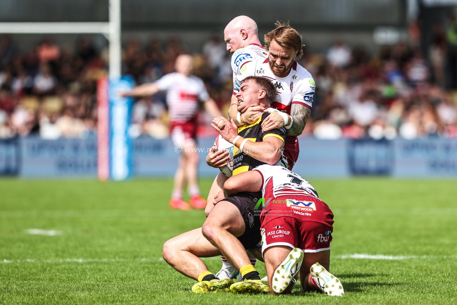 Oli Field of York Knights is tackled by Adam Keighran of Wigan Warriors during the Betfred Super League round 15 match York Knights vs Wigan Warriors at LNER Community Stadium, York, United Kingdom on 20 June 2026

(Photo by Alfie Cosgrove/News Images)