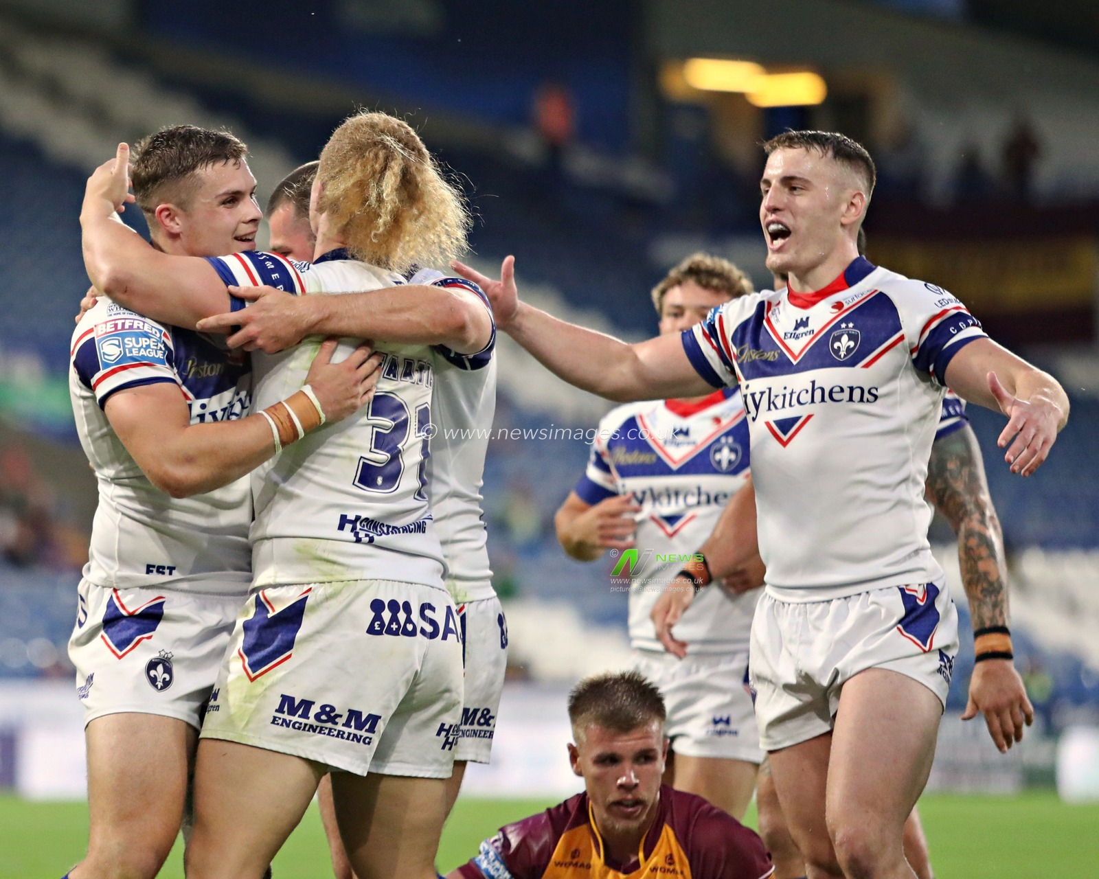 Cameron Scott of Wakefield Trinity celebrates scoring a try during the Betfred Super League round 19 match Huddersfield Giants vs Wakefield Trinity at the Accu Stadium, Huddersfield, United Kingdom, 18th July 2025(Photo by Sam Eaden/News Images)