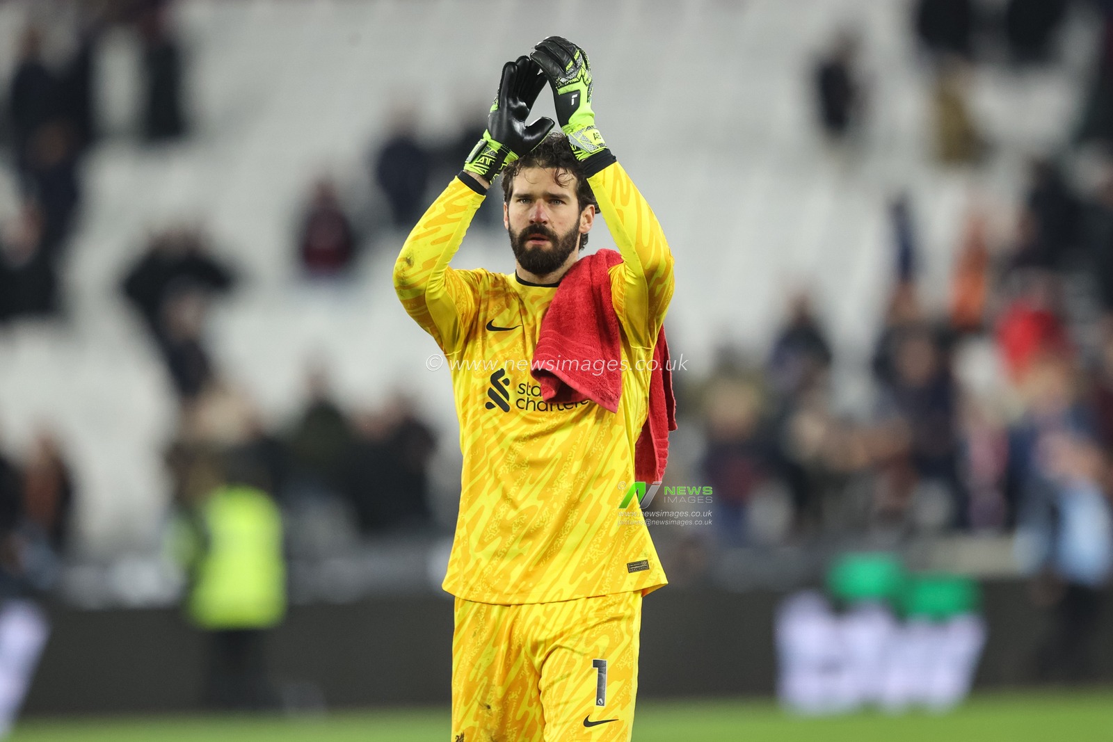 Alisson Becker of Liverpool applauds the fans after the final whistle during the Premier League match West Ham United vs Liverpool at London Stadium, London, United Kingdom, 29th December 2024

(Photo by Alfie Cosgrove/News Images)