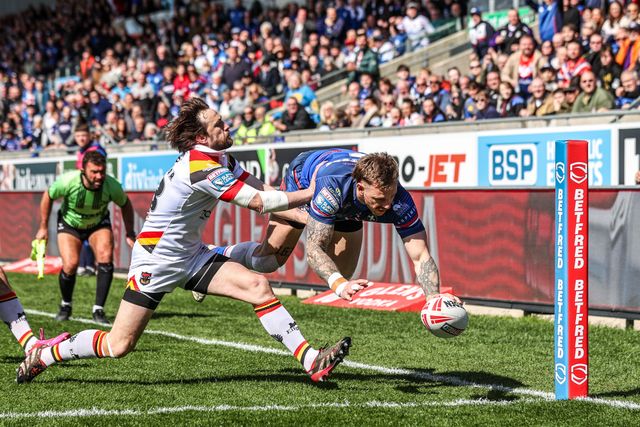 Tom Johnstone of Wakefield Trinity goes over for a try during the Betfred Super League round 8 match Wakefield Trinity vs Bradford Bulls at DIY Kitchens Stadium, Wakefield, United Kingdom on 18 April 2026

(Photo by Alfie Cosgrove/News Images)