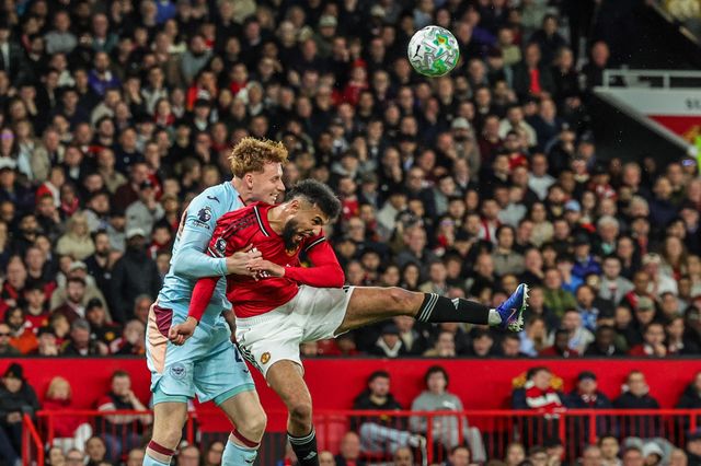 Noussair Mazraoui of Manchester United heads clear under pressure from Sepp van den Berg of Brentford during the Premier League match Manchester United vs Brentford at Old Trafford, Manchester, United Kingdom on 27 April 2026

(Photo by Mark Cosgrove/News Images)