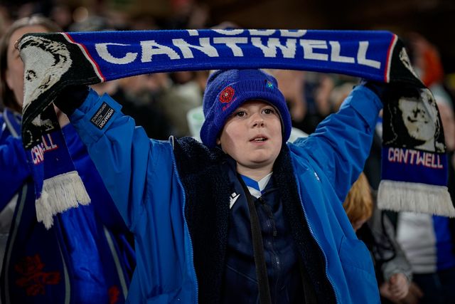 A fan holds a scarf of Todd Cantwell of Blackburn Rovers as Blackburn fans celebrate their team victory during the Sky Bet Championship match Sheffield United vs Blackburn Rovers at Bramall Lane, Sheffield, United Kingdom on 22 April 2026

(Photo by Maynard Manyowa/News Images)