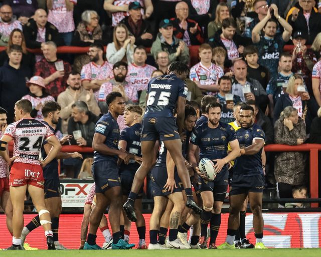Joe Mellor of Salford Red Devils celebrates his try with team mates during the Betfred Super League Round 23 match Leigh Leopards vs Salford Red Devils at Leigh Sports Village, Leigh, United Kingdom, 22nd August 2025

(Photo by Mark Cosgrove/News Images)
