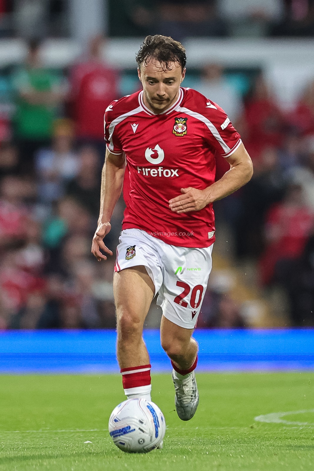 Ollie Rathbone of Wrexham breaks with the ball during the Sky Bet Championship match Wrexham vs Birmingham City at The Racecourse Ground, Wrexham, United Kingdom on 28 August 2026

(Photo by Mark Cosgrove/News Images)