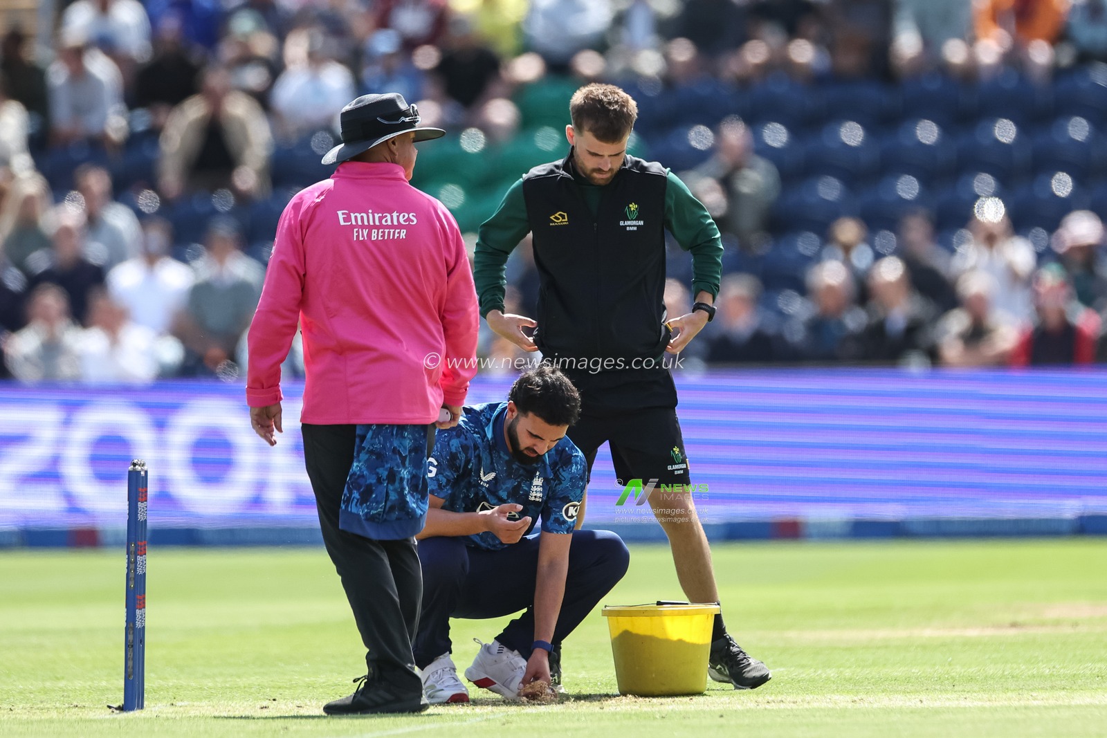 Saqib Mahmood of England puts sawdust on the crease to aid his bowling during the 2nd Metro Bank ODI England v West Indies at Sophia Gardens Cricket Ground, Cardiff, United Kingdom, 1st June 2025

(Photo by Mark Cosgrove/News Images)