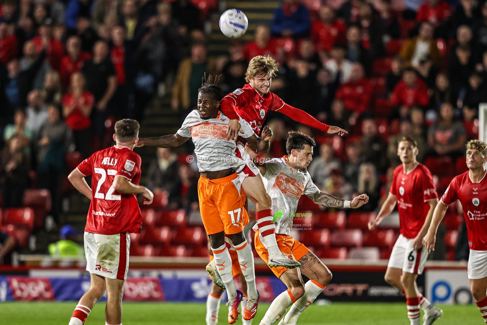Luca Connell of Barnsley jumps up to win the high ball from Karoy Anderson of Blackpool during the Sky Bet League One match Barnsley vs Blackpool at Oakwell, Barnsley, United Kingdom on 02 September 2026

(Photo by Alfie Cosgrove/News Images)