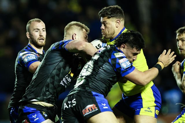 Joe Philbin of Warrington Wolves is tackled during the Betfred Super League Round 6 match Warrington Wolves vs Leeds Rhinos at Halliwell Jones Stadium, Warrington, United Kingdom, 28th March 2025

(Photo by Mark Cosgrove/News Images)