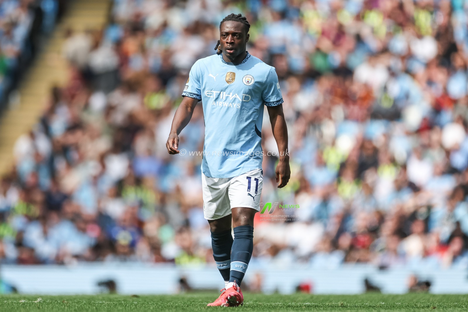JÃ©rÃ©my Doku of Manchester City during the Premier League match Manchester City vs Crystal Palace at Etihad Stadium, Manchester, United Kingdom, 12th April 2025

(Photo by Mark Cosgrove/News Images)