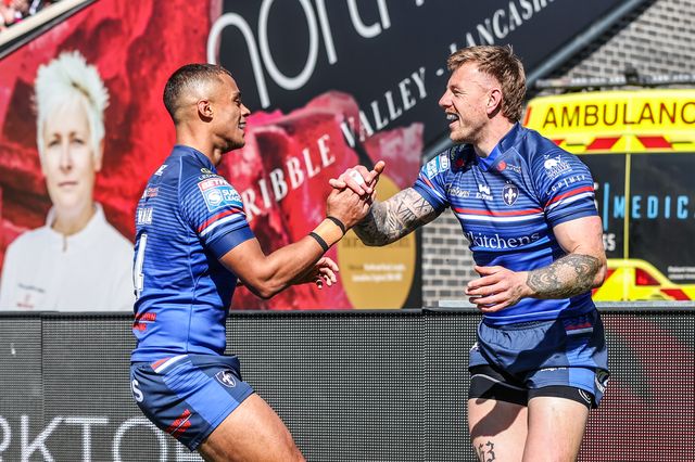 Tom Johnstone of Wakefield Trinity celebrates his try during the Betfred Super League round 8 match Wakefield Trinity vs Bradford Bulls at DIY Kitchens Stadium, Wakefield, United Kingdom on 18 April 2026

(Photo by Alfie Cosgrove/News Images)