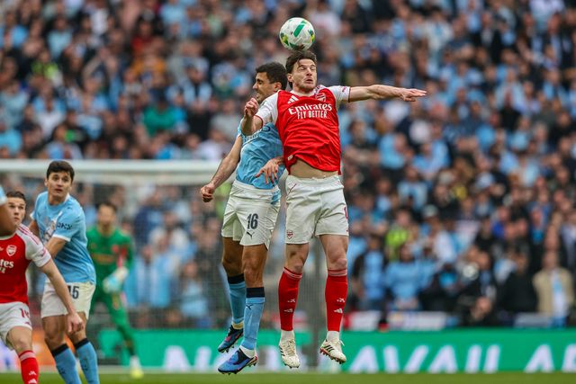 Declan Rice of Arsenal battle for the ball in the air with Rodrigo of Manchester City during the Carabao Cup Final match Arsenal vs Manchester City at Emirates, London, United Kingdom on 22 March 2026

(Photo by Alfie Cosgrove/News Images)
