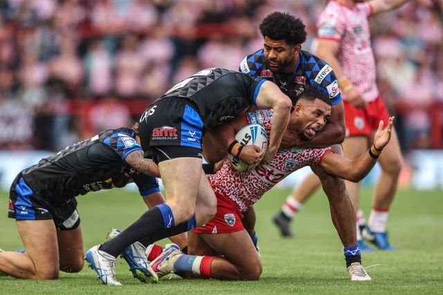 Umyla Hanley of Leigh Leopards is tackled during the Betfred Super League round 21 match Leigh Leopards vs Leeds Rhinos at Leigh Sports Village, Leigh, United Kingdom, 7th August 2025

(Photo by Alfie Cosgrove/News Images)