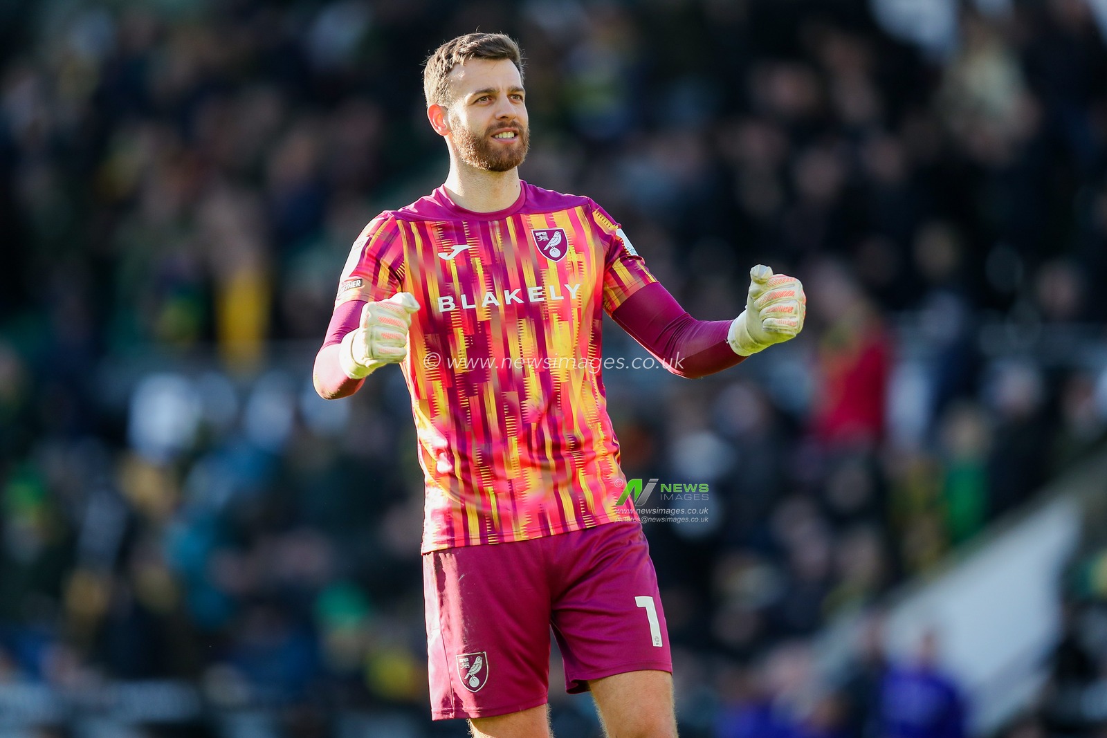 Angus Gunn of Norwich City celebrates after the teams victory following the Sky Bet Championship match Norwich City vs Swansea City at Carrow Road, Norwich, United Kingdom, 25th January 2025

(Photo by Izzy Poles/News Images)