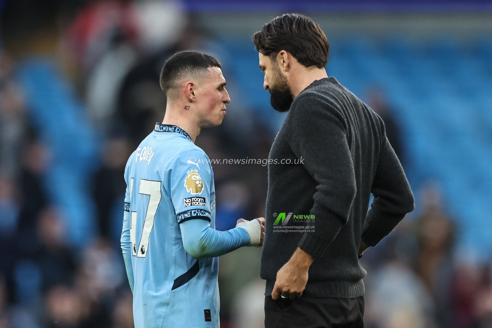 Phil Foden of Manchester City speaks to Russell Martin manager of Southampton after the final whistle during the Premier League match Manchester City vs Southampton at Etihad Stadium, Manchester, United Kingdom, 26th October 2024

(Photo by Mark Cosgrove/News Images)