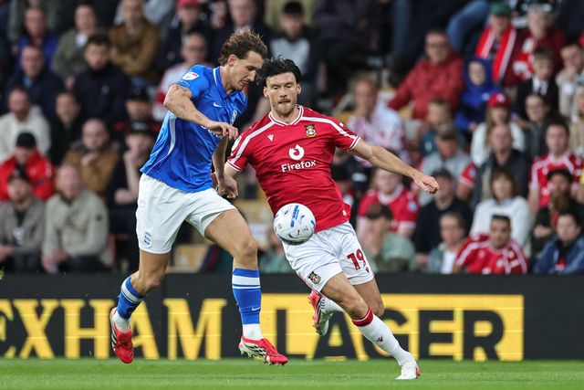 Phil Neumann of Birmingham City and Kieffer Moore of Wrexham battle for the ball during the Sky Bet Championship match Wrexham vs Birmingham City at The Racecourse Ground, Wrexham, United Kingdom on 28 August 2026

(Photo by Mark Cosgrove/News Images)