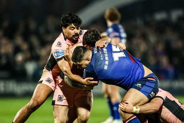 Caleb Hamlin-Uele of Wakefield Trinity is tackled by Connor Bailey of Hull FC during the Betfred Super League match Wakefield Trinity vs Hull FC at DIY Kitchens Stadium, Wakefield, United Kingdom on 05 March 2026

(Photo by Alfie Cosgrove/News Images)