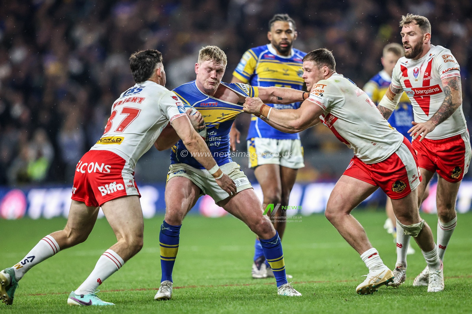 James McDonnell of Leeds Rhinos is tackled during the Betfred Super League play-off Eliminator 1 match Leeds Rhinos vs St Helens at Headingley Stadium, Leeds, United Kingdom, 27th September 2025

(Photo by Alfie Cosgrove/News Images)