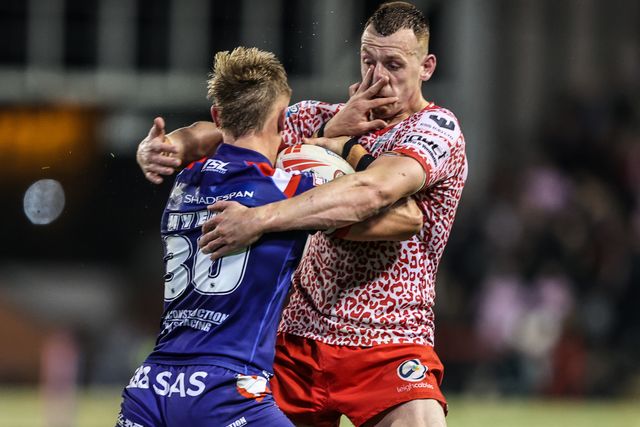 Jayden Myers of Wakefield Trinity is tackled by Frankie Halton of Leigh Leopards during the Betfred Super League play-off Eliminator 1 match Leigh Leopards vs Wakefield Trinity at Progress With Unity Stadium, Leigh, United Kingdom, 26th September 2025

(Photo by Alfie Cosgrove/News Images)