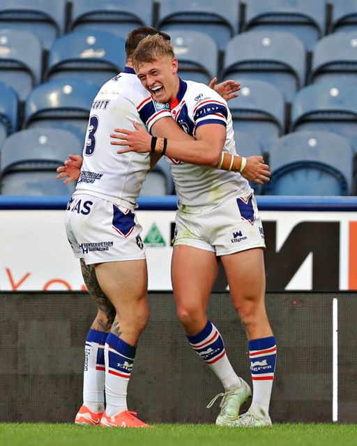 Jayden Myers of Wakefield Trinity celebrates scoring his second try during the Betfred Super League round 19 match Huddersfield Giants vs Wakefield Trinity at the Accu Stadium, Huddersfield, United Kingdom, 18th July 2025

(Photo by Sam Eaden/News Images)