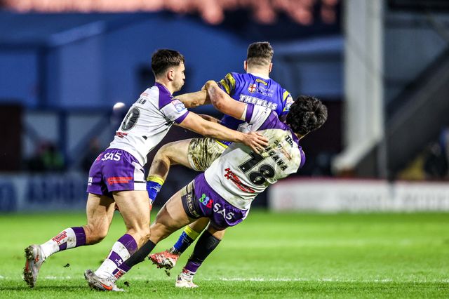 Josh Thewlis of Warrington Wolves is tackled by Isaiah Vagana of Wakefield Trinity during the Betfred Super League Round 3 match Warrington Wolves vs Wakefield Trinity at The Halliwell Jones Stadium, Warrington, United Kingdom on 28 February 2026

(Photo by Alfie Cosgrove/News Images)