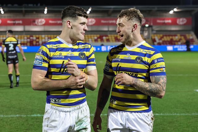 Josh Thewlis of Warrington Wolves and Sam Powell of Warrington Wolves celebrate the win with the fans during the Betfred Super League Round 4 match York Knights vs Warrington Wolves at LNER Community Stadium, York, United Kingdom on 06 March 2026

(Photo by Mark Cosgrove/News Images)