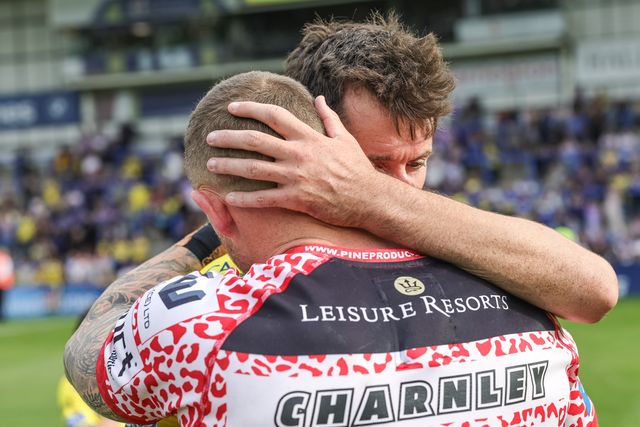 Josh Charley of Leigh Leopards embraces former team mate Stefan Ratchford of Warrington Wolves on his last ever home game as he announces his retirement during the Betfred Super League Round 25 match Warrington Wolves vs Leigh Leopards at Halliwell Jones Stadium, Warrington, United Kingdom, 6th September 2025

(Photo by Mark Cosgrove/News Images)