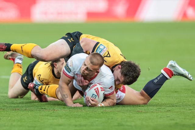 Mikey Lewis of Hull KR is tackled during the Betfred Super League round 10 match Hull KR vs Castleford Tigers at Sewell Group Craven Park, Hull, United Kingdom on 30 April 2026

(Photo by Mark Cosgrove/News Images)
