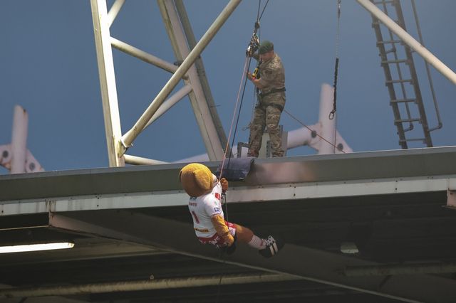 St Helens mascot Boots abseils off the roof with help of the Royal Marines to deliver the match ball during the Betfred Super League Round 25 match St Helens vs Wigan Warriors at Totally Wicked Stadium, St Helens, United Kingdom, 5th September 2025

(Photo by Mark Cosgrove/News Images)