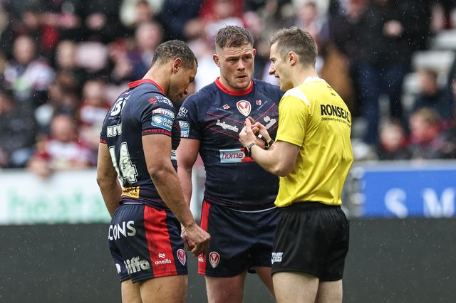 Referee Chris Kendall speaks to Moses Mbye of St. Helens before giving him a yellow card during the Betfred Super League Round 8 match Wigan Warriors vs St Helens at The Brick Community Stadium, Wigan, United Kingdom, 18th April 2025

(Photo by Mark Cosgrove/News Images)