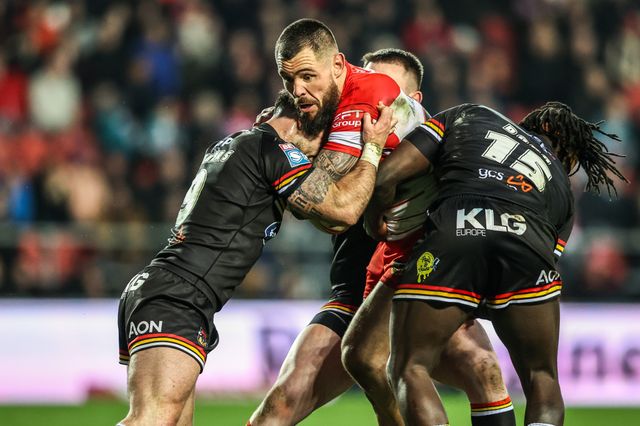 David Klemmer of St Helens is tackled by Andy Ackers of Bradford Bulls and Eribe Doro of Bradford Bulls during the Betfred Super League round 4 match St Helens vs Bradford Bulls at The BrewDog Stadium, St Helens, United Kingdom on 07 March 2026

(Photo by Alfie Cosgrove/News Images)