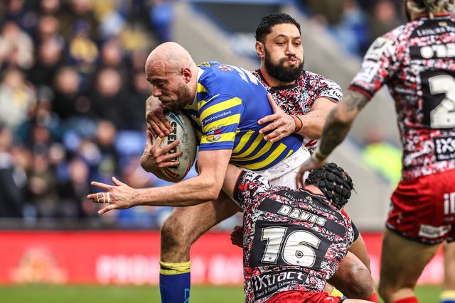 James Harrison of Warrington Wolves is tackled by Matt Davis of Leigh Leopards during the Betfred Super League round 7 match Warrington Wolves vs Leigh Leopards at The Halliwell Jones Stadium, Warrington, United Kingdom on 04 April 2026

(Photo by Alfie Cosgrove/News Images)