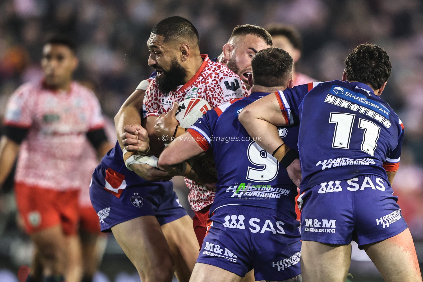 Isaac Liu of Leigh Leopards is tackled by Liam Hood of Wakefield Trinity during the Betfred Super League play-off Eliminator 1 match Leigh Leopards vs Wakefield Trinity at Progress With Unity Stadium, Leigh, United Kingdom, 26th September 2025

(Photo by Alfie Cosgrove/News Images)