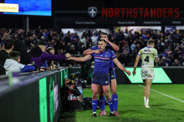 Oliver Pratt of Wakefield Trinity celebrates his try with the fans during the Betfred Challenge Cup round 4 match Wakefield Trinity vs Leeds Rhinos at DIY Kitchens Stadium, Wakefield, United Kingdom on 13 March 2026

(Photo by Mark Cosgrove/News Images)
