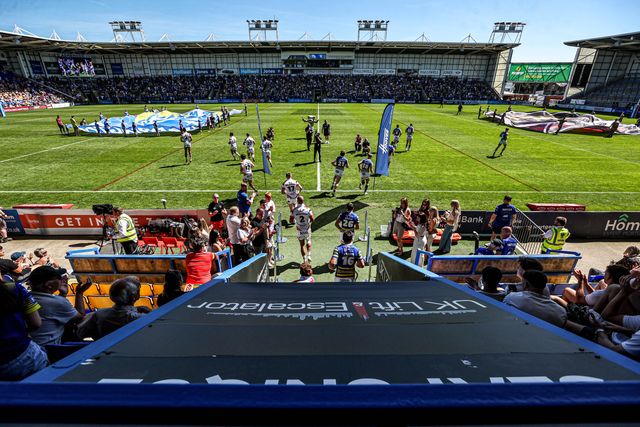 The teams come out for the Betfred Super League round 12 match Warrington Wolves vs Bradford Bulls at The Halliwell Jones Stadium, Warrington, United Kingdom on 24 May 2026

(Photo by Alfie Cosgrove/News Images)