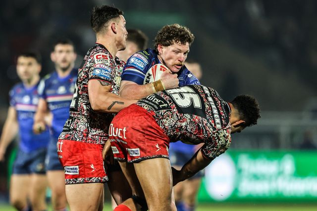 Ky Rodwell of Wakefield Trinity is tackled by Owen Trout of Leigh Leopards and Jacob Alick-Wiencke of Leigh Leopards during the Betfred Super League round 5 match Wakefield Trinity vs Leigh Leopards at DIY Kitchens Stadium, Wakefield, United Kingdom on 20 March 2026

(Photo by Alfie Cosgrove/News Images)
