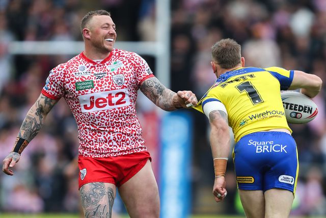 Josh Charley of Leigh Leopards grabs a hold of Matt Dufty of Warrington Wolves during the Betfred Super League Round 8 match Leigh Leopards vs Warrington Wolves at Leigh Sports Village, Leigh, United Kingdom, 19th April 2025

(Photo by Gareth Evans/News Images)