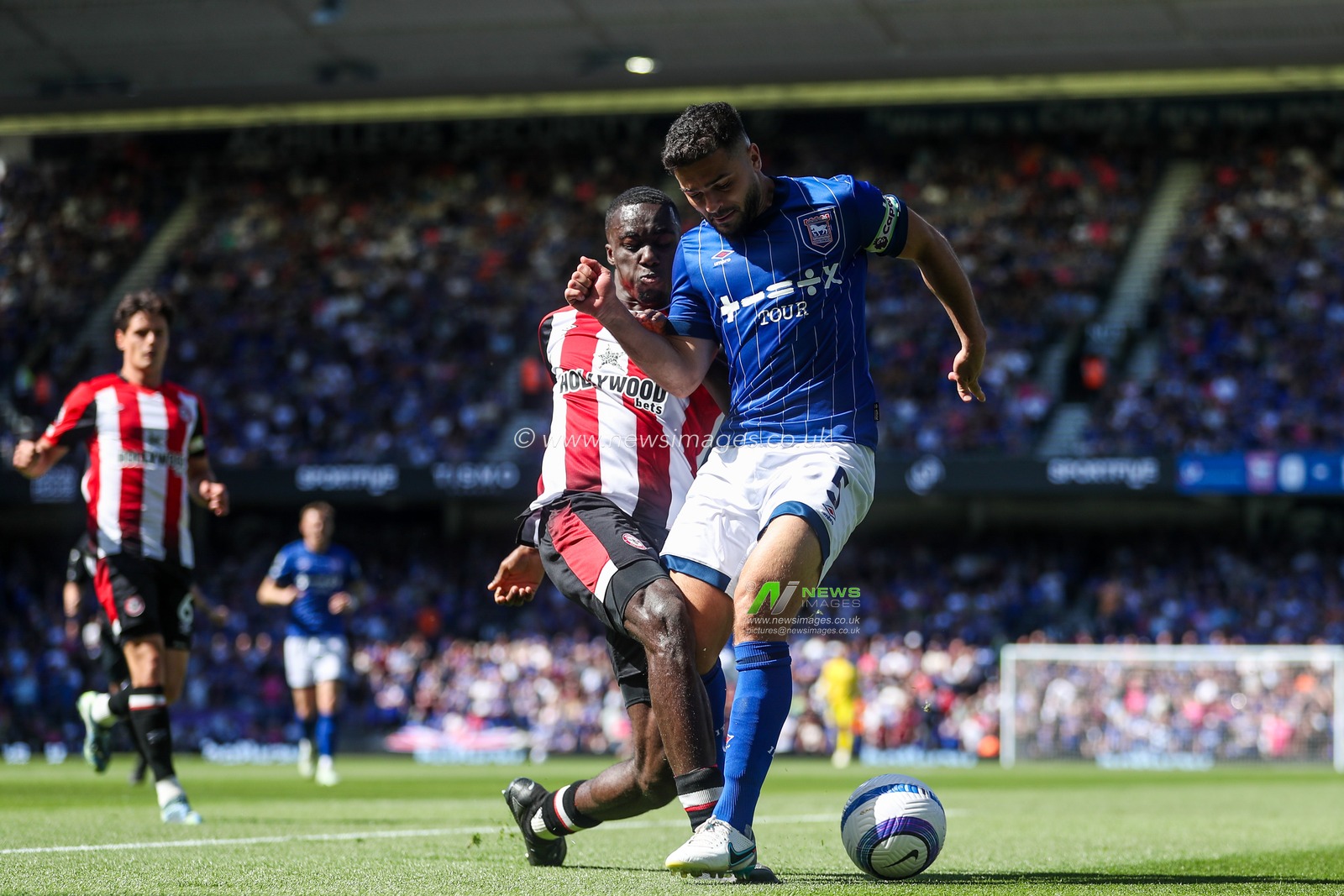 Michael Kayode of Brentford tackles Sam Morsy of Ipswich Town during the Premier League match Ipswich Town vs Brentford at Portman Road, Ipswich, United Kingdom, 10th May 2025

(Photo by Izzy Poles/News Images)