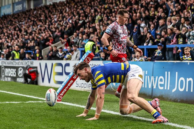 Matty Ashton of Warrington Wolves goes over for a try during the Betfred Super League round 7 match Warrington Wolves vs Leigh Leopards at The Halliwell Jones Stadium, Warrington, United Kingdom on 04 April 2026

(Photo by Alfie Cosgrove/News Images)