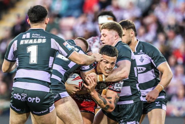 Owen Trout of Leigh Leopards is tackled by Harry Rushton of Huddersfield Giants during the Betfred Super League round 9 match Leigh Leopards vs Huddersfield Giants at Leigh Sports Village, Leigh, United Kingdom on 23 April 2026

(Photo by Alfie Cosgrove/News Images)