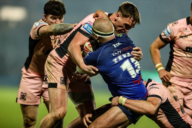 Jazz Tevaga of Wakefield Trinity is tackled by Harvie Hill of Hull FC during the Betfred Super League match Wakefield Trinity vs Hull FC at DIY Kitchens Stadium, Wakefield, United Kingdom on 05 March 2026

(Photo by Alfie Cosgrove/News Images)