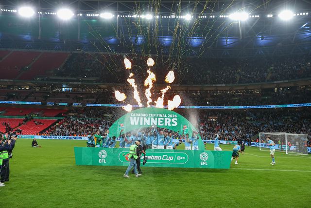 Manchester City players lift the trophy after the final whistle during the Carabao Cup Final match Arsenal vs Manchester City at Emirates, London, United Kingdom on 22 March 2026

(Photo by Alfie Cosgrove/News Images)